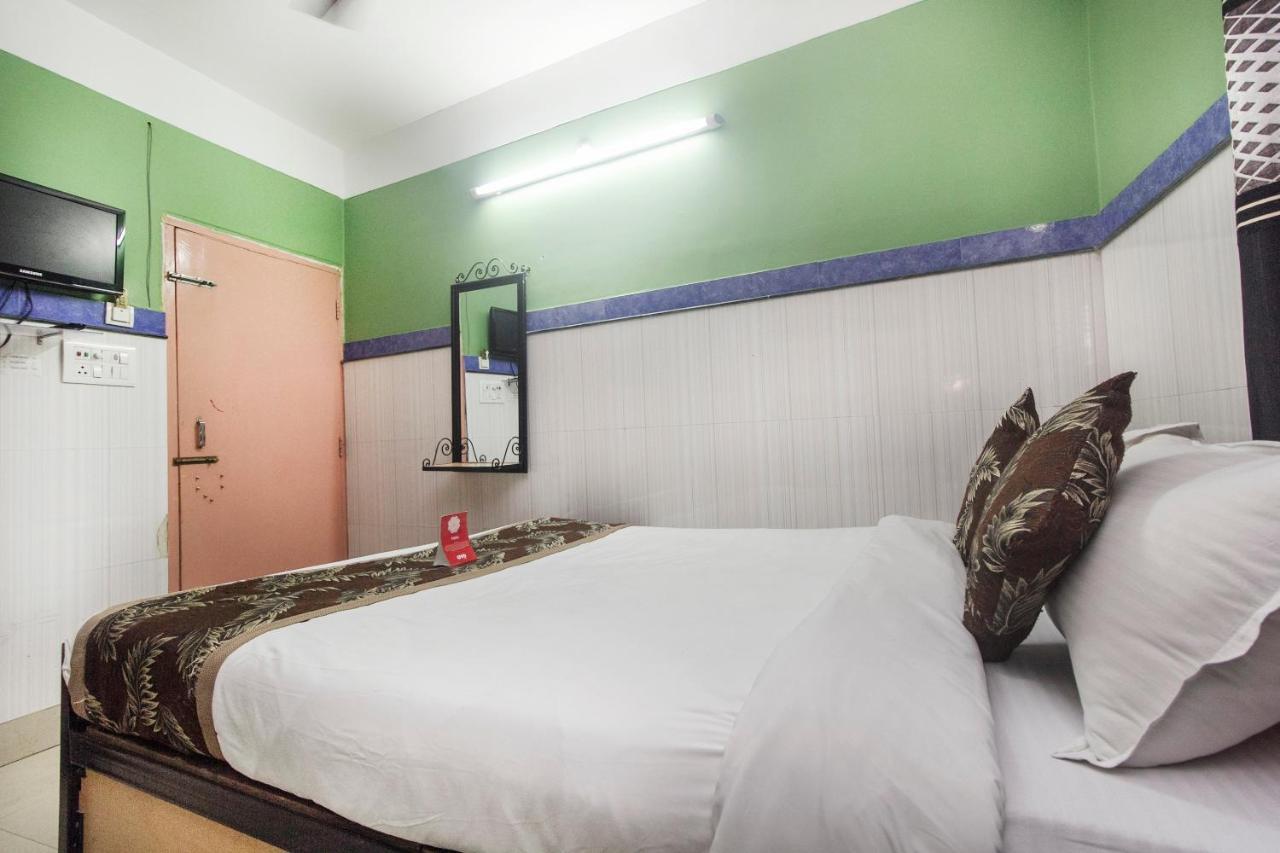 Oyo 16064 Tirupati Lodge Силигури Экстерьер фото